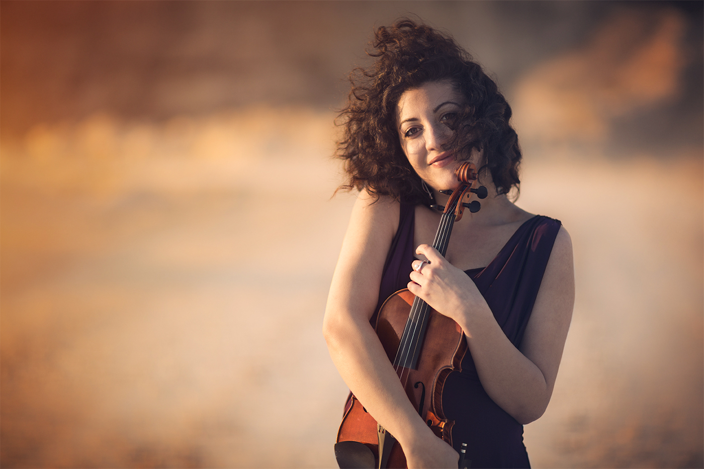 Musician and violin. Female portrait Luzy